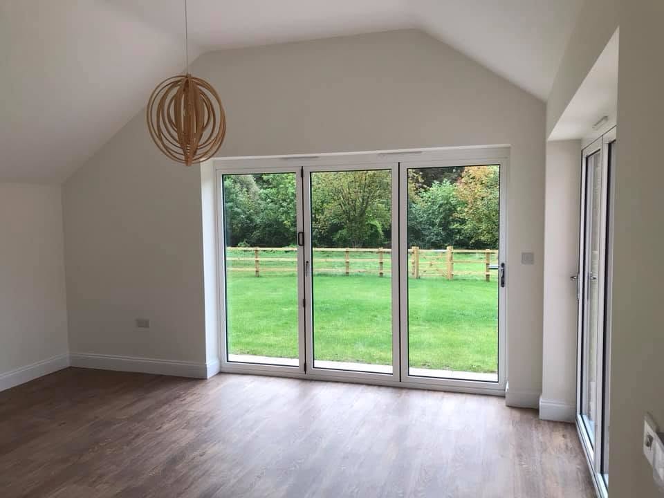 Vaulted lounge interior in a new-build home constructed by JRC Developers, builders in Feckenham, Worcestershire